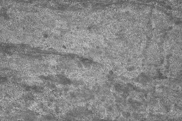 Grey concrete textured surface as background, closeup