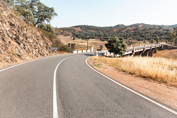 Embalse de Aracena - a bridge over the reservoir of Aracena in Corteconcepcion, Sierra de Aracena natural park, province of Huelva, Andalusia, Spain