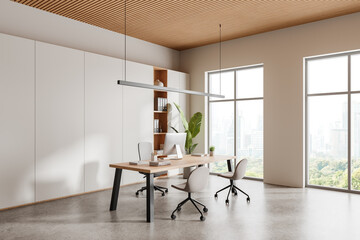 Cozy workspace interior with ceo desk and shelf with panoramic window