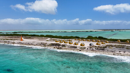 Red Slave Huts At Kralendijk In Bonaire Netherlands Antilles. Island Beach. Blue Sea Landscape....