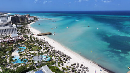 Palm Beach At Oranjestad In Caribbean Netherlands Aruba. Caribbean Beach. Blue Sea Background....