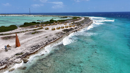 Red Slave Huts At Kralendijk In Bonaire Netherlands Antilles. Island Beach. Blue Sea Landscape....