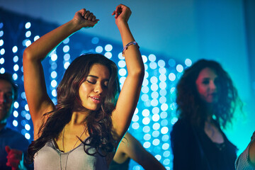 Dancing, woman and confidence in nightclub for birthday, new year and party or disco in Mexico....