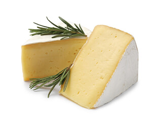 Pieces of tasty camembert cheese and rosemary isolated on white