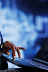 IT consultant writes code on tablet to visualize artificial intelligence neural networks using augmented reality, close up. High tech establishment manager runs AI script for information processing