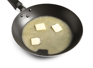 Melting butter in frying pan on white background