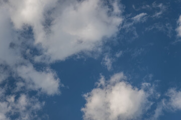 A bright blue sky full of clouds