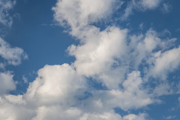 A bright blue sky full of clouds