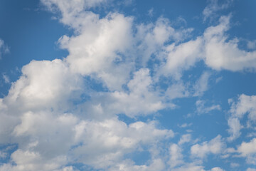 A bright blue sky full of clouds