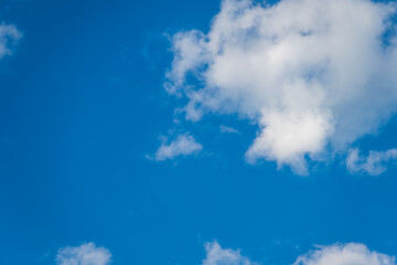 A bright blue sky full of clouds