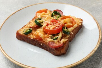 Tasty pizza toast on grey table, closeup