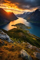 Obraz premium Breathtaking sunset over a fjord landscape