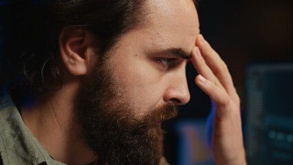Stressed programmer updating artificial intelligence neural networks, writing binary code scripts....