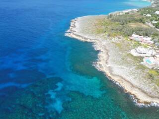 Aerial view of Bodden Town Pedro St James Savannah with iron shore community pristine blue turquoise water of the Caribbean sea ocean, Grand Cayman, Cayman Islands