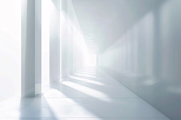 Fototapeta premium ong white hallway with bright sunlight streaming in from one side casting dramatic shadows on the floor and walls