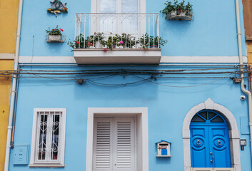 House on Town Hall Square in Giardini Naxos in the Metropolitan City of Messina on the island of Sicily, Italy - obrazy, fototapety, plakaty