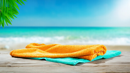 Summer background and decoration of towel on the beach, Sunny hot day.