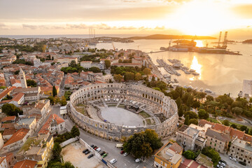 Aerial view of the historic Roman Amphitheatre of Pula at sunset, Croatia © Mazur Travel