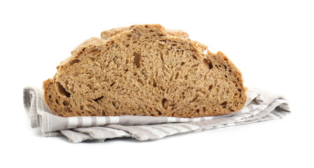 Freshly baked cut sourdough bread and napkin isolated on white