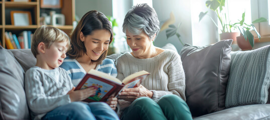 of the family on the sofa, the child reading aloud from a book, with the mother and grandmother listening attentively, enjoying the peaceful togetherness, Family, Mother’s day, wit