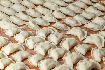 Vareniky dumplings before being boiled. Traditional Ukraine hand-made food.