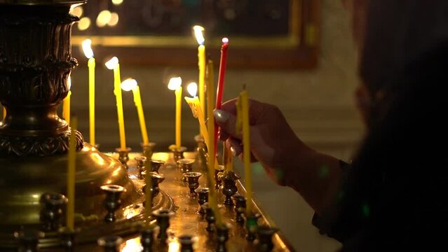 Candles are lit during church services. Christian traditions, holidays