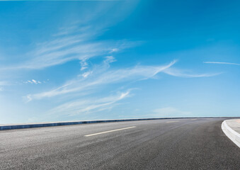 Graphic design background featuring a car on an asphalt road highway