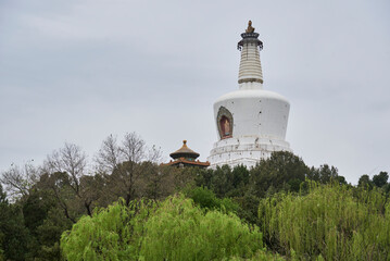 Fototapeta na wymiar White Pagoda on Jade Flower Island in Beihai Park in Beijing, China