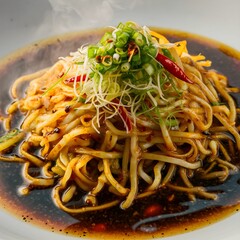Plate of Saut&eacute;ed Noodles in Chili Sauce with Onions and Hot Peppers