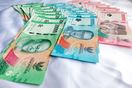 Top view of Indonesian rupiah note. Indonesian Rupiah the official currency of Indonesia. New Uang Rupiah Indonesia. Bank Indonesia. Flat lay, high angle view. Indonesia.