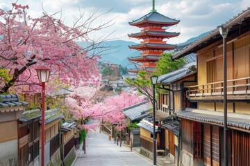 Obraz premium Cherry blossoms and pagoda in Kyoto, Japan, with pink flowers. Generate AI image
