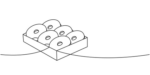 Glazed donuts in box one line continuous drawing. Bakery sweet pastry food. Vector linear illustration.