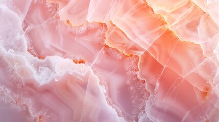 A closeup of rose quartz, a soft pink stone with subtle veins and highlights in peachy tones, against a light background.