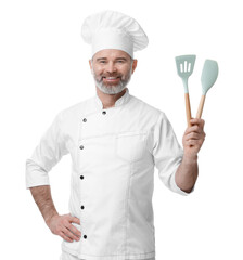 Happy chef in uniform holding kitchen utensils on white background