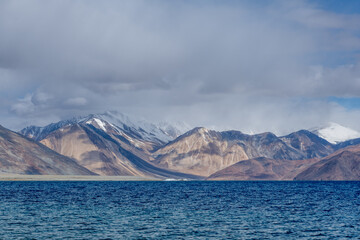 Crystal clear waters of Pangong Lake on the border of India and Tibet, the world's highest...