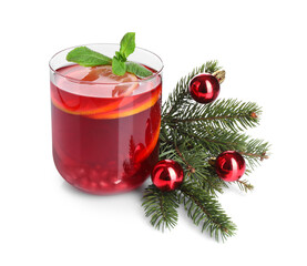 Christmas Sangria drink in glass, fir branch and baubles on white background