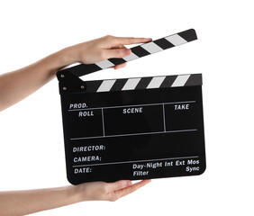 Woman holding movie clapper on white background, closeup