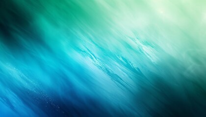 Obraz premium A blue and green blurred abstract background is presented, showcasing minimalist backgrounds and gradient color blends.