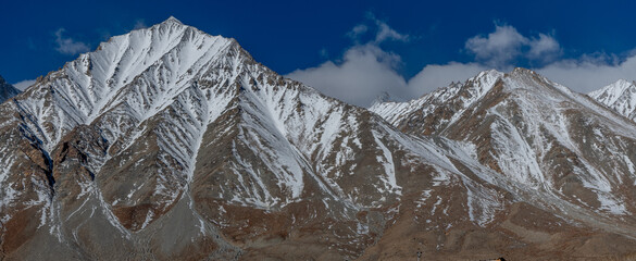 Kangju Kangri, at 22,064 feet, and mountains in the Karakoram Range near Pangong Lake along the border between Tibet and India