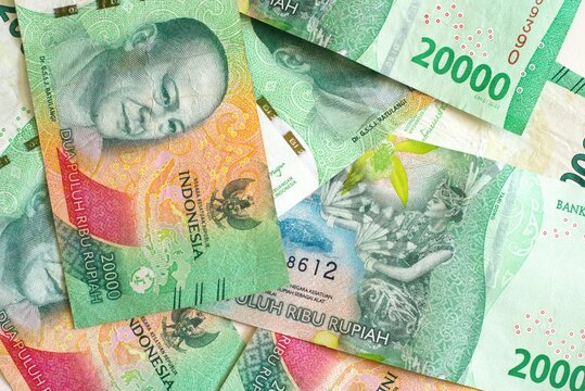 Heap of twenty thousand rupiah banknotes, Indonesian Currency background