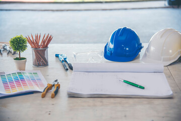 construction engineer office desk architect workplace. engineer drawing objects table with meter,...