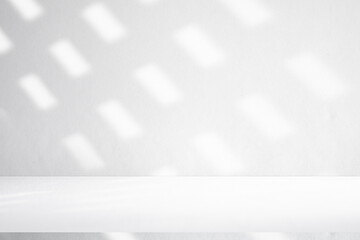 Wall interior background, studio and backdrops show products.with shadow from window color white and grey. background for text insertion and presentation product