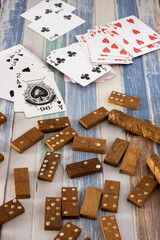 domino and poker cards on the table