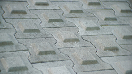 Interlocking stone block tile floor