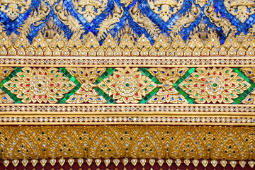 beautiful Thai painting pattern On the outer wall of the Mondop, an old Buddhist temple where the...