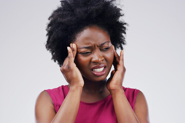 Black woman, hand and temple migraine in studio with mental health stress, depression or pain....