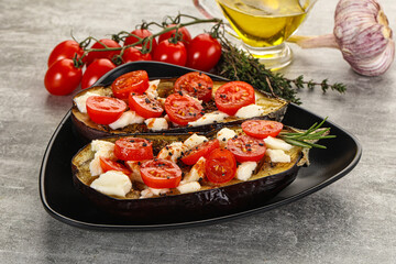 Baked eggplant with cheese and tomato