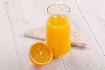 Sweet fresh orange juice in the glass