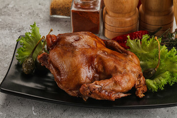 Baked small chicken with spices