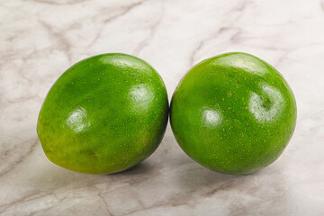 Two ripe green exotic avocado fruit